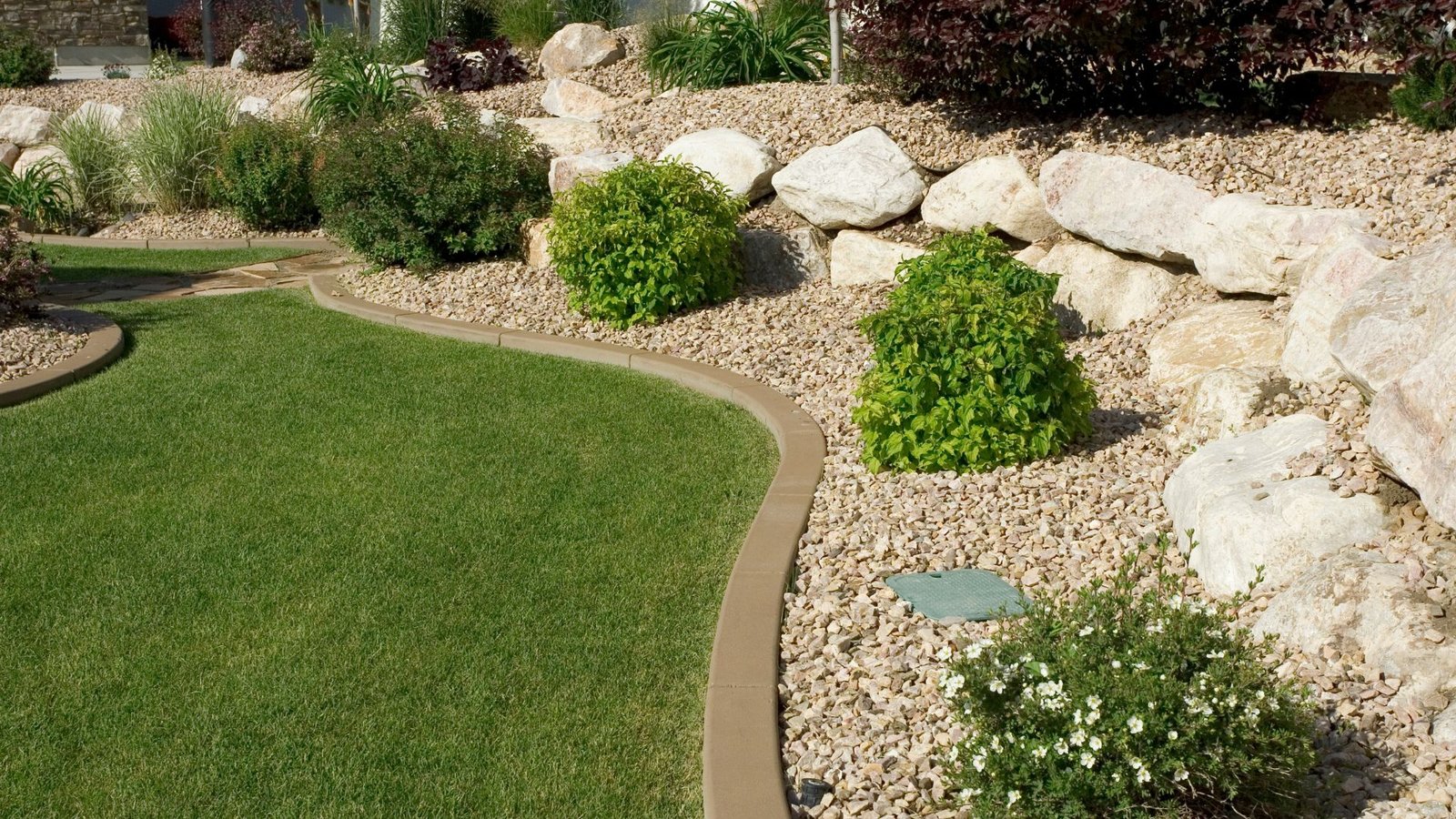 Professional Landscaping Services in Oakland County, MI: Retaining Walls, Boulders, Trees & Shrubs, Water Features, & More